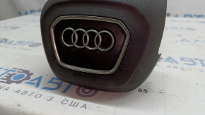 Airbag in the steering wheel, driver's side, Audi Q8 19-26, black, covered in soot