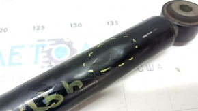 The rear left shock absorber of Honda Accord 23-26 is dented