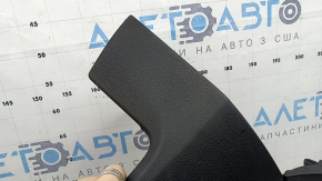 The driver's knee pad for the Audi Q8 19-26 is black and covered in soot
