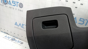 The driver's knee pad for the Audi Q8 19-26 is black and covered in soot