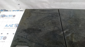 The trunk floor of the Audi Q8 19-26 is black, sooty, and worn