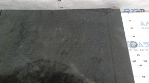 The trunk floor of the Audi Q8 19-26 is black, sooty, and worn