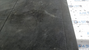 The trunk floor of the Audi Q8 19-26 is black, sooty, and worn