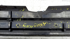 The radiator grille of the Honda Insight 19-22 is bare, black gloss, cracks, non-factory holes, broken fasteners, missing fragments of fasteners
