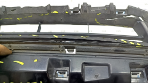 The base of the radiator grille Honda Insight 19-22 with the emblem, cracks, missing fragments