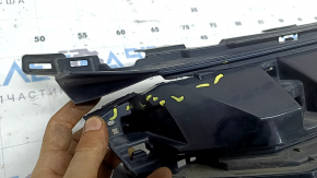 The base of the radiator grille Honda Insight 19-22 with the emblem, cracks, missing fragments