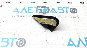 Subaru Forester 19-24 SK right triangle wing molding, black with chrome, seal peeled off