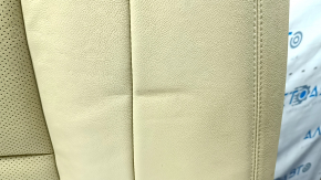 The back of the rear row of seats of the Hyundai Sonata 11-14 is beige leather, without headrests, dented, faded
