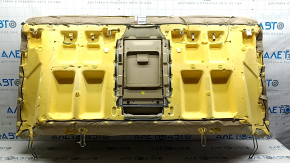 The back of the rear row of seats of the Hyundai Sonata 11-14 is beige leather, without headrests, dented, faded