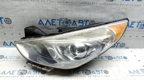 Front left headlight Hyundai Sonata 11-15 hybrid halogen, scratches, faded
