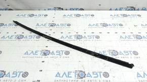The left windshield molding of the Audi Q8 19-26 is melted