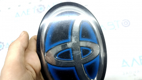 Emblem badge for the front bumper of Toyota Prius V 12-17 under the radar cruise, scratches, for polishing