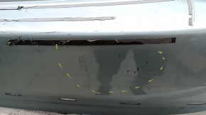 Bare rear bumper Toyota Prius V 15-17 under the lip, green, scratches, chips, cracked fasteners, cracks, tear