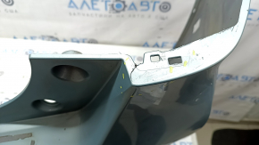 Bare rear bumper Toyota Prius V 15-17 under the lip, green, scratches, chips, cracked fasteners, cracks, tear