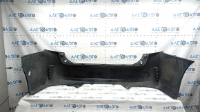 Bare rear bumper Toyota Prius V 15-17 under the lip, green, scratches, chips, cracked fasteners, cracks, tear