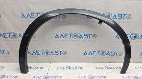 The front right fender arch trim for Lexus RX 23-26 Japan built is dented