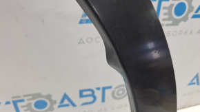 The front right fender arch trim for Lexus RX 23-26 Japan built is dented
