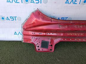 The rear panel of the Hyundai Santa FE 21-23 is drilled, red
