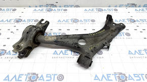 The lower front left control arm of a Honda Insight 19-22 is torn