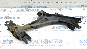The lower front left control arm of a Honda Insight 19-22 is torn