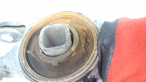 The lower front left control arm of a Honda Insight 19-22 is torn