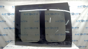 The sunroof glass of Toyota Prius V 12-17 has scratches, glue, and peeling varnish