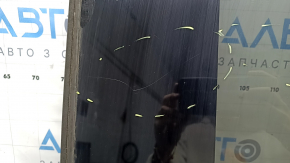 The sunroof glass of Toyota Prius V 12-17 has scratches, glue, and peeling varnish