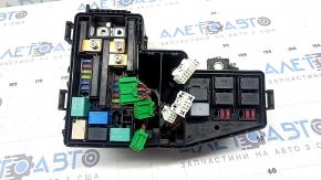 The underhood fuse box for a Honda Insight 19-20 is large, without a cover or wiring, and the fasteners are broken