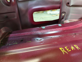 The trunk trough of the Hyundai Sonata 11-15 hybrid on the body is dented