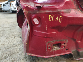 The rear panel of the Hyundai Sonata 11-15 on the body is dented