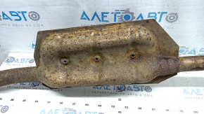 The exhaust pipe, middle part of the Subaru Forester 19-24 SK, is rusty