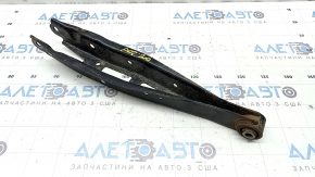 The lower rear right transverse control arm of the Subaru Forester 19-24 SK is rusty