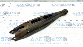 The lower rear right transverse control arm of the Subaru Forester 19-24 SK is rusty