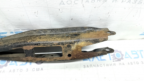 The lower rear right transverse control arm of the Subaru Forester 19-24 SK is rusty
