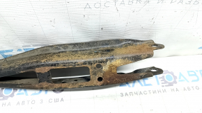 The lower rear left transverse control arm of the Subaru Forester 19-24 SK is rusty