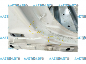 The central right body pillar of a Ford Mustang Mach-E 21-26 is on the body and is dented