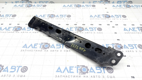 The right subframe reinforcement for Toyota Prius V 12-17 is dented