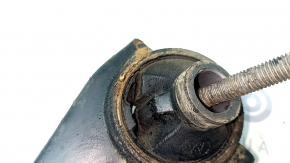 The lower front right control arm of a Subaru Forester 19-24 SK is rusty, the silent block is torn, and it is dented
