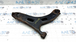 The lower front left control arm of a Subaru Forester 19-24 SK is rusty and the silent block is torn