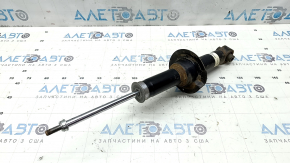 The rear right shock absorber for Subaru Forester 19-21 SK is rusty and dented