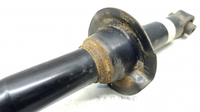 The rear right shock absorber for Subaru Forester 19-21 SK is rusty and dented