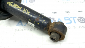 The rear right shock absorber for Subaru Forester 19-21 SK is rusty and dented