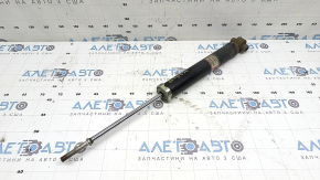 The rear right shock absorber of Toyota Prius V 14-17 is rusty