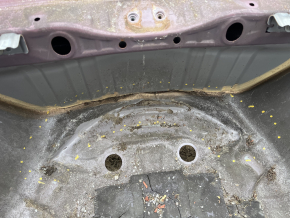 The trunk trough of the Subaru Forester 19-24 SK on the body is dented