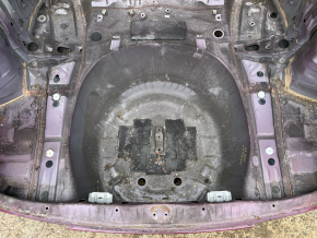 The trunk trough of the Subaru Forester 19-24 SK on the body is dented