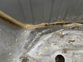 The trunk trough of the Subaru Forester 19-24 SK on the body is dented