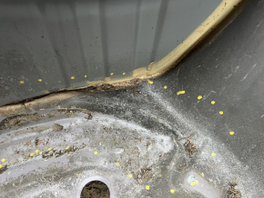 The trunk trough of the Subaru Forester 19-24 SK on the body is dented
