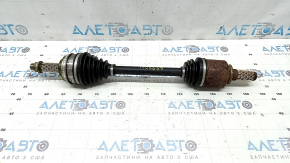 The front left half shaft of a Toyota Camry 92-01 is rusty, with play in the inner CV joint