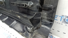 The left underbody protection of Nissan Murano z52 15-24 is dented and torn
