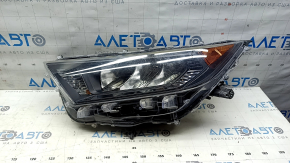 Front left headlight Toyota Rav4 19-25 reflector, black, USA built scratches